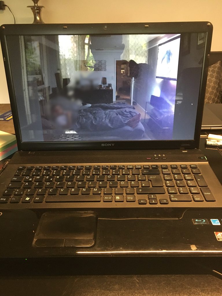 Romance and Investment Scams: The Warning Signs A person looking worried at a laptop